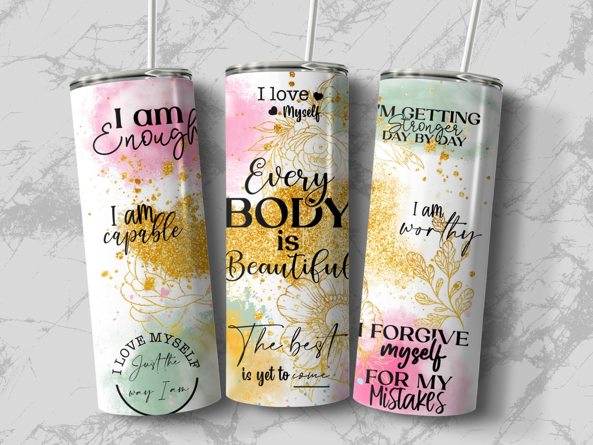 Flat lay of the Self Love Affirmation 20oz tumbler showing the full blush and gold wrap design