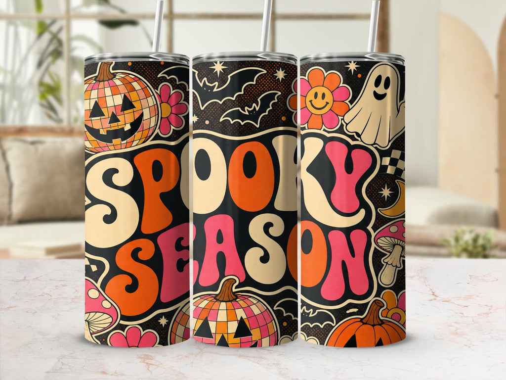 Preview of Spooky Season lettering, disco pumpkins, ghosts, bats, flowers and checkered accents on a tumbler mockup